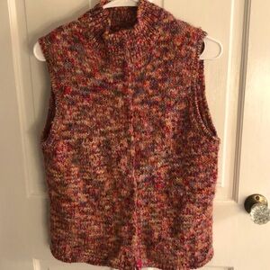 Classic Talbot’s MP snap-front vest in jewel tones. 41% acrylic 35% wool 22% pol